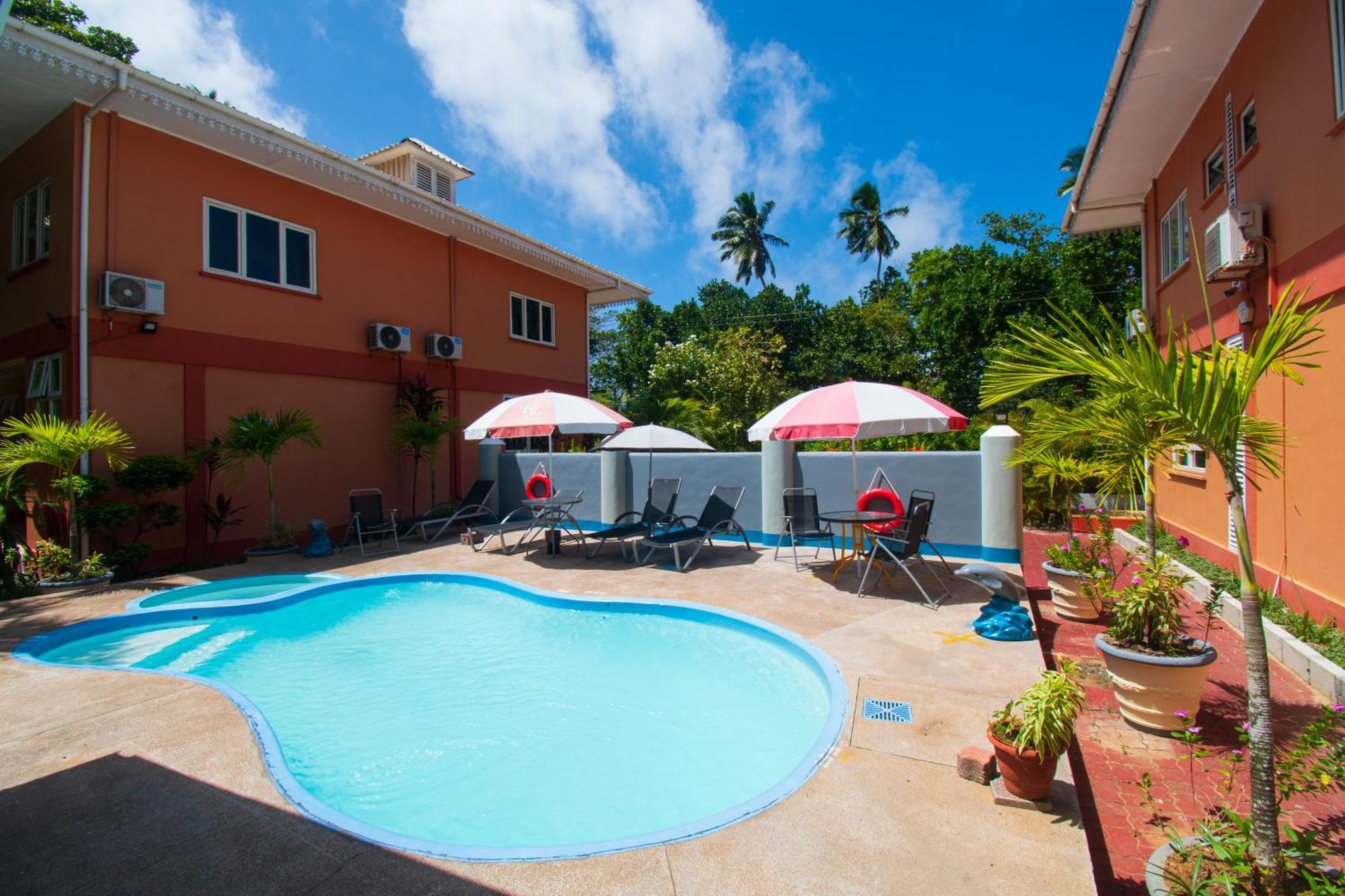 Reef Holiday Apartments Anse aux Pins Exterior foto